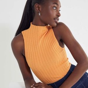 Soft and bright mock neck sleeveless top